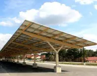 A large solar panel sitting under a parking lot.